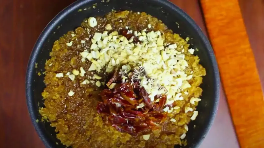 dried fruits, spices, and seeds in a pan