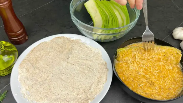 Coating Zucchini in Egg and Cheese Mixture