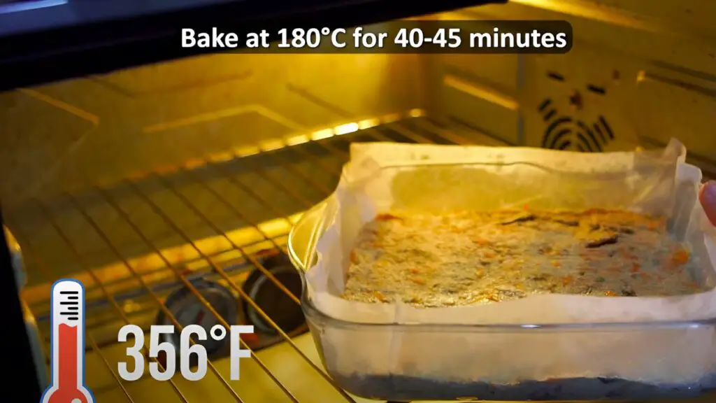 baking the carrot cake in a preheated oven