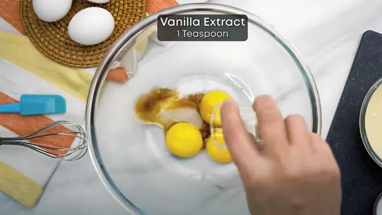 combining egg yolks with vanilla extract