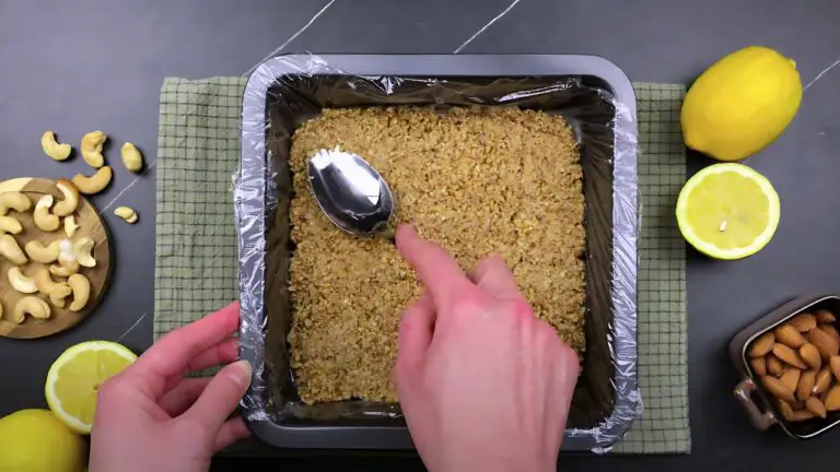 pressing the mixture into a baking tray