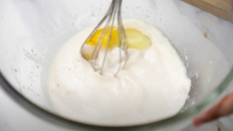 Add egg into the mixture 