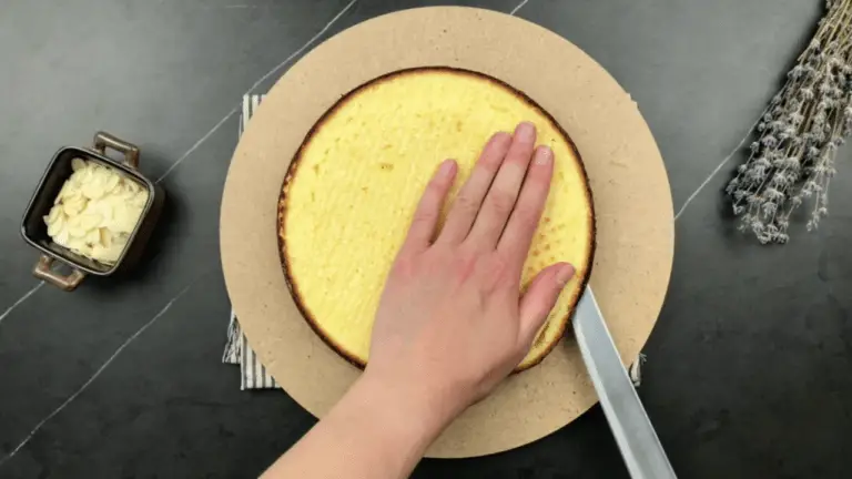 slicing the cake with a knife