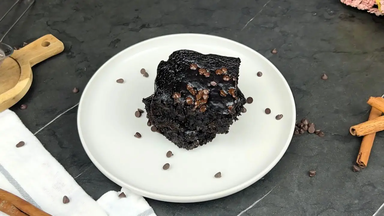 freshly baked sweet potato brownies on a white plate