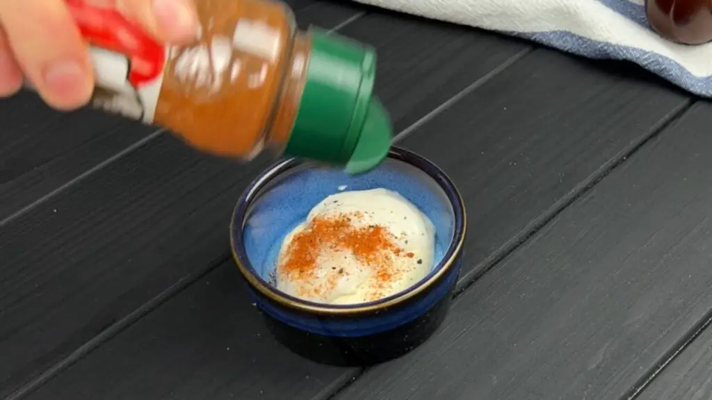 making the dip for the potatoes