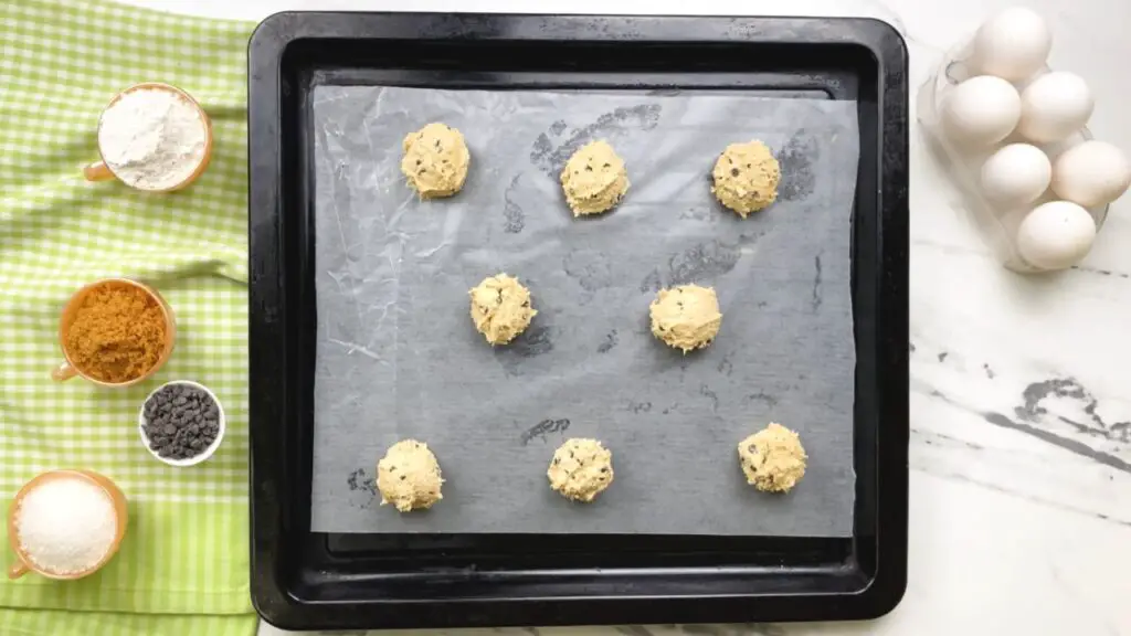 Line baking sheets with parchment paper