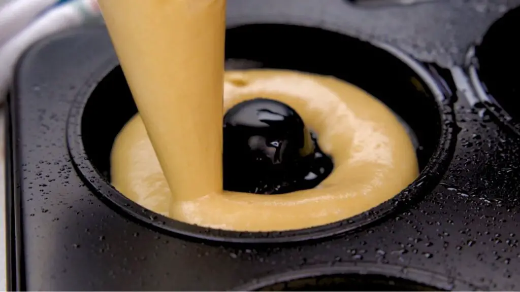 making donuts in a donut pan