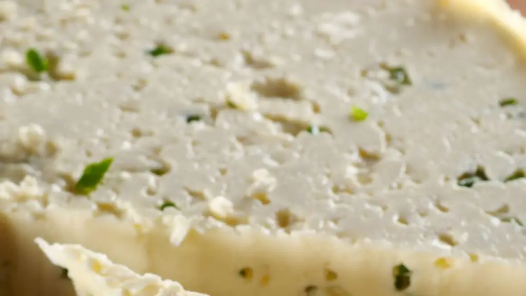 adding herbs to the cheese