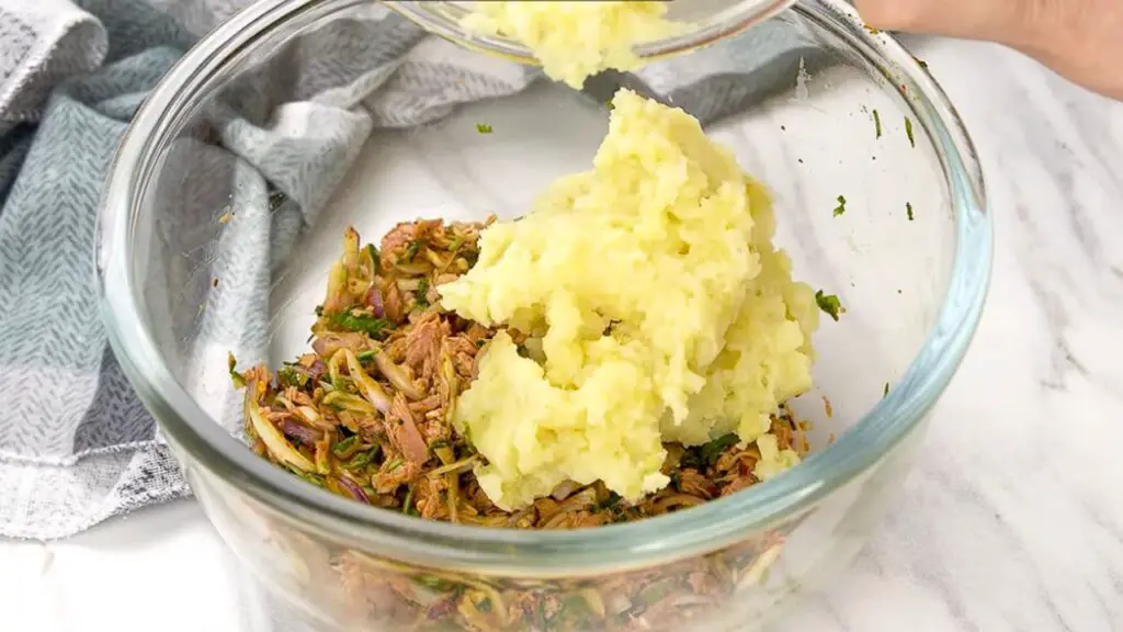 combining of tuna and potato mixture