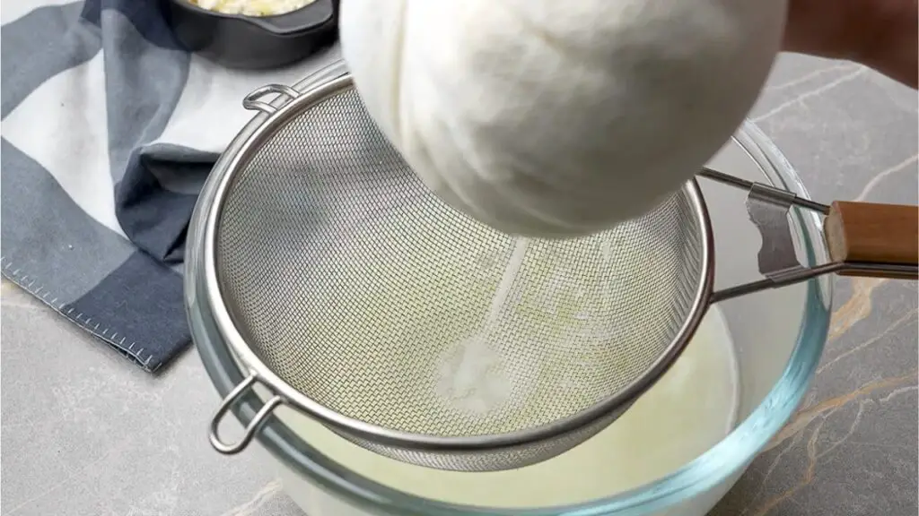 draining of cheese