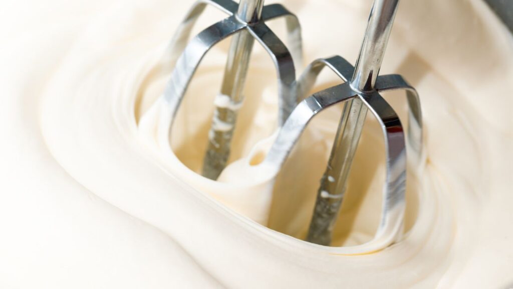 whipping heavy cream into butter