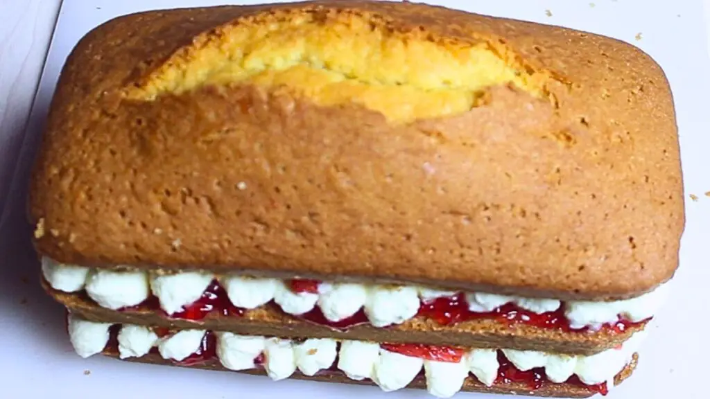 Victoria sponge cake with strawberry jam and cream