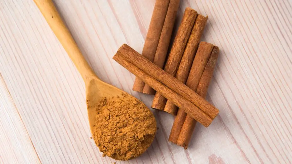 adding cinnamon to cookie dough