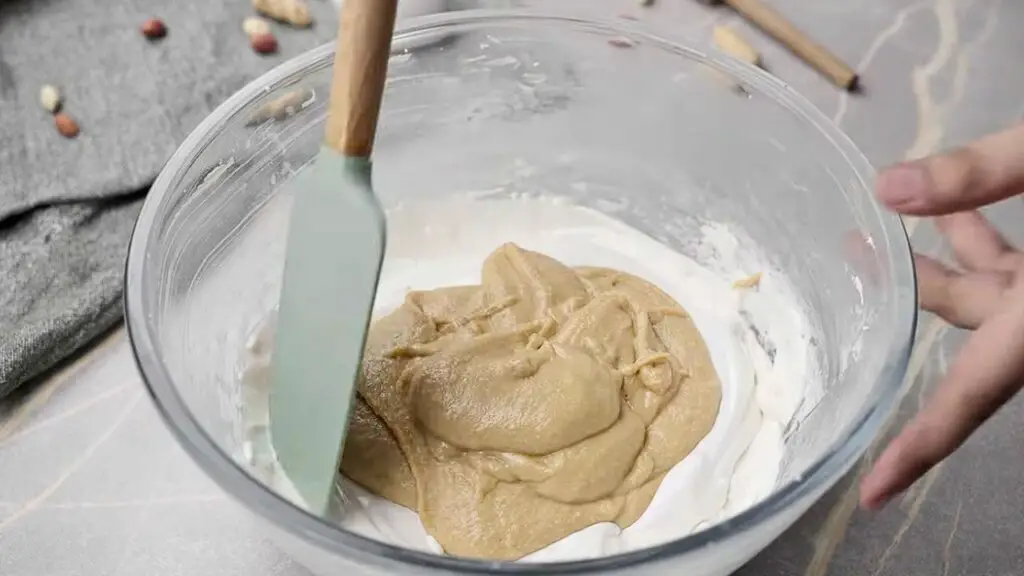 adding the peanut paste