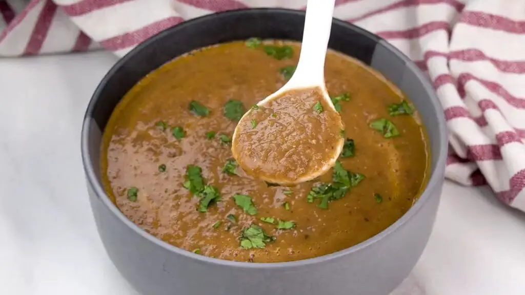 serving lentil soup