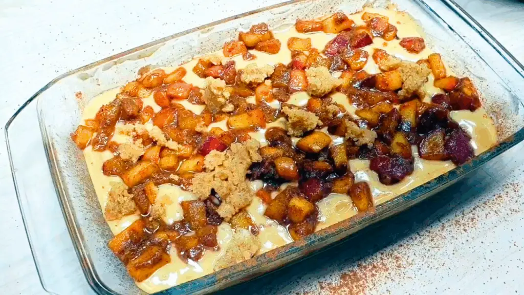 assembling the Apple cake with crumble topping