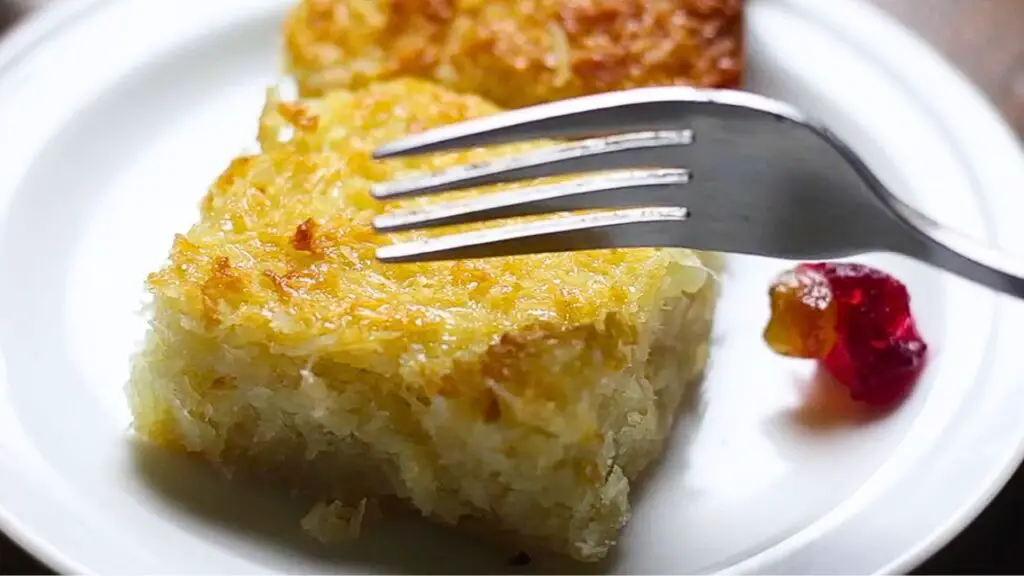 serving the coconut cake moist