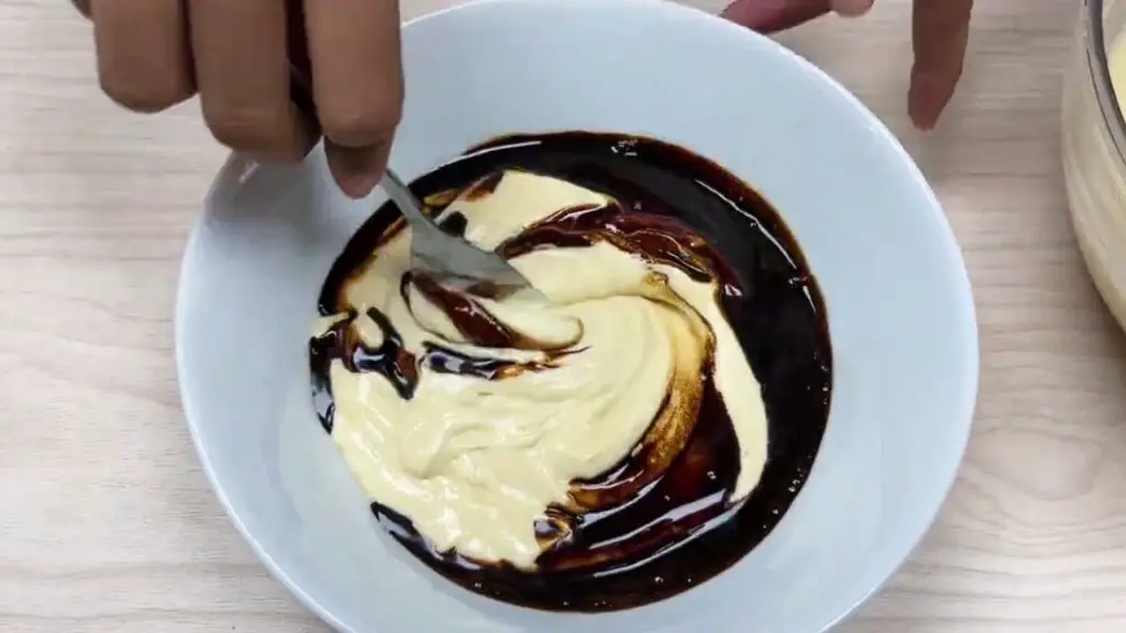 adding coffee to the Coffee loaf cake batter