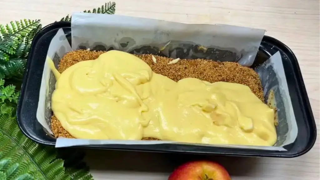 layering the moist apple loaf cake