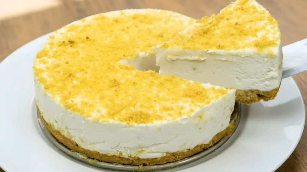 cutting a slice of no-bake cheesecake