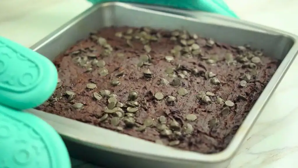 freshly baked healthy black bean brownies topped with chocolate chips