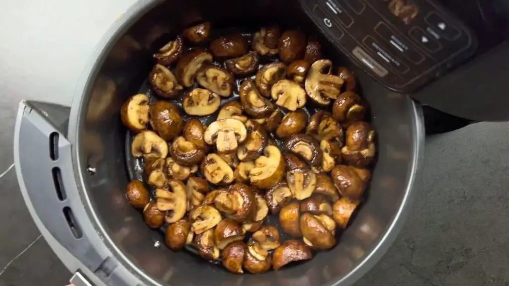 How long to air fry mushrooms as the mushrooms are browned and ready to be transferred to a serving bowl