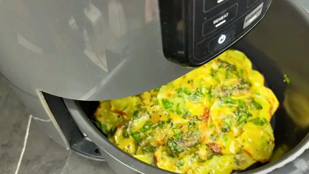 Reheating potatoes in air fryer until hot and crispy.