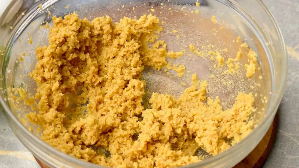Creamed butter, granulated sugar, and brown sugar mixed into a light, fluffy mixture for air fryer peanut butter cookies.