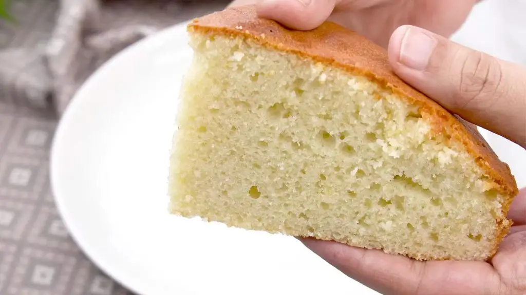 Baking in air fryer produces a yogurt cake with a golden top and a soft, moist, evenly baked center.