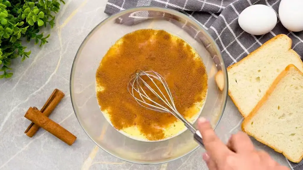 Cinnamon and vanilla whisked into the egg mixture for French toast in the air fryer.