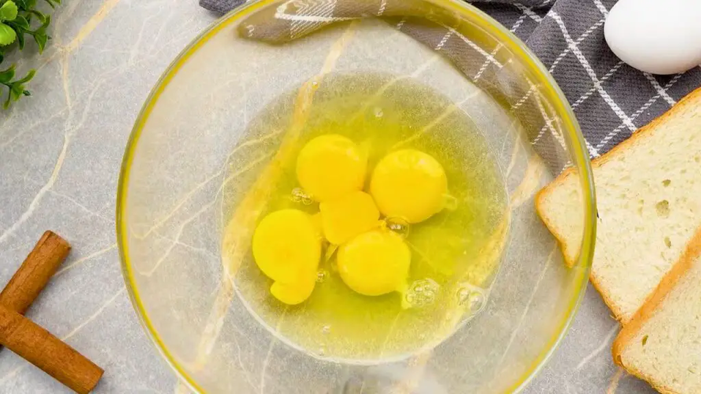 Eggs in a bowl for making air fryer French toast.