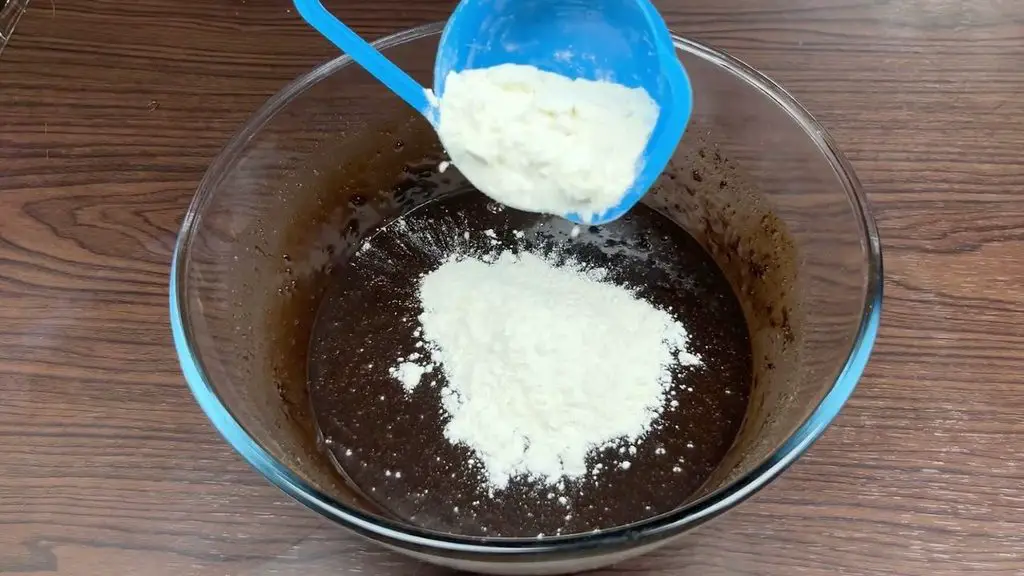 Homemade brownies batter with all-purpose flour added gradually for a rich, fudgy texture.