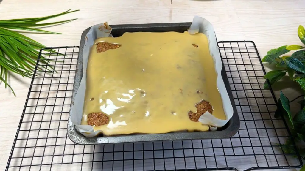 Pour the toffee sauce over the warm cake